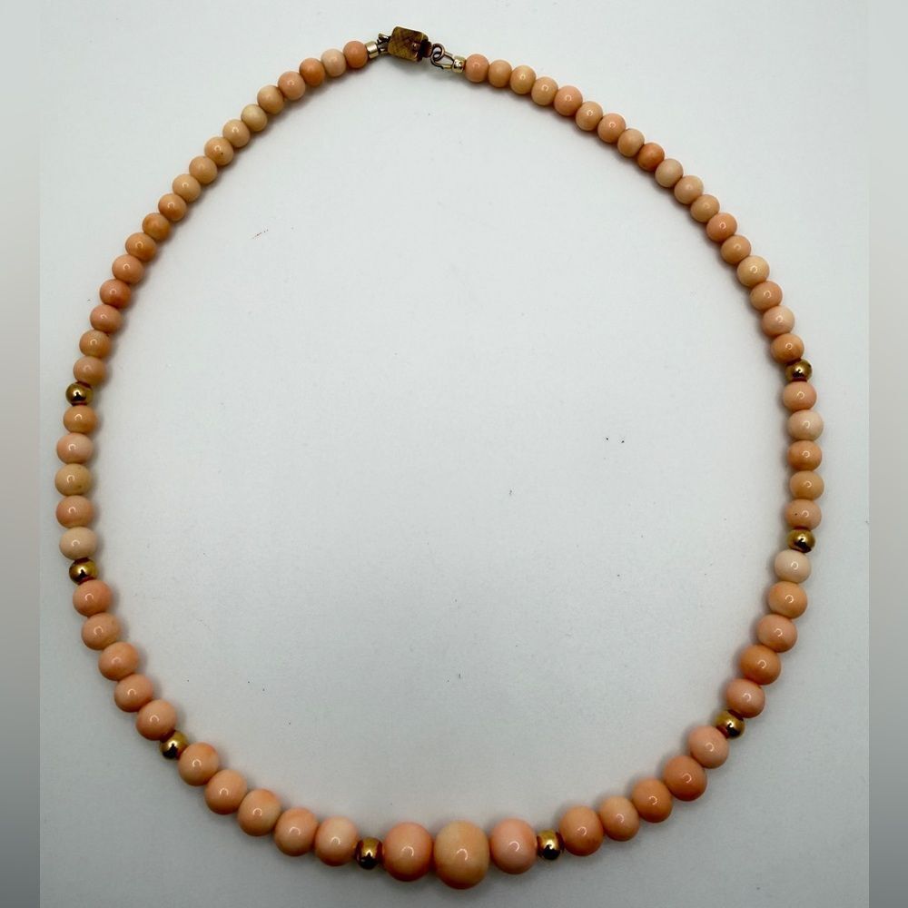~17" Graduated Angel Skin Coral and 14kt yellow gold accent beads and VTG clasp!